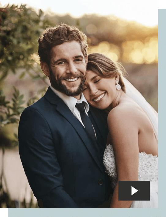 Bride and groom embracing and smiling